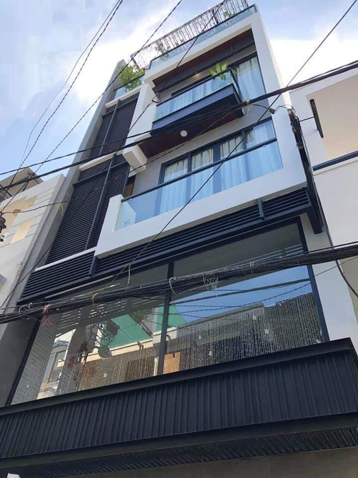Cho thuê nhà HXH Nguyễn Thị Minh Khai Q.1, (5.2x13m), 4 tầng mới 100%, giá 55 tr/thg TL