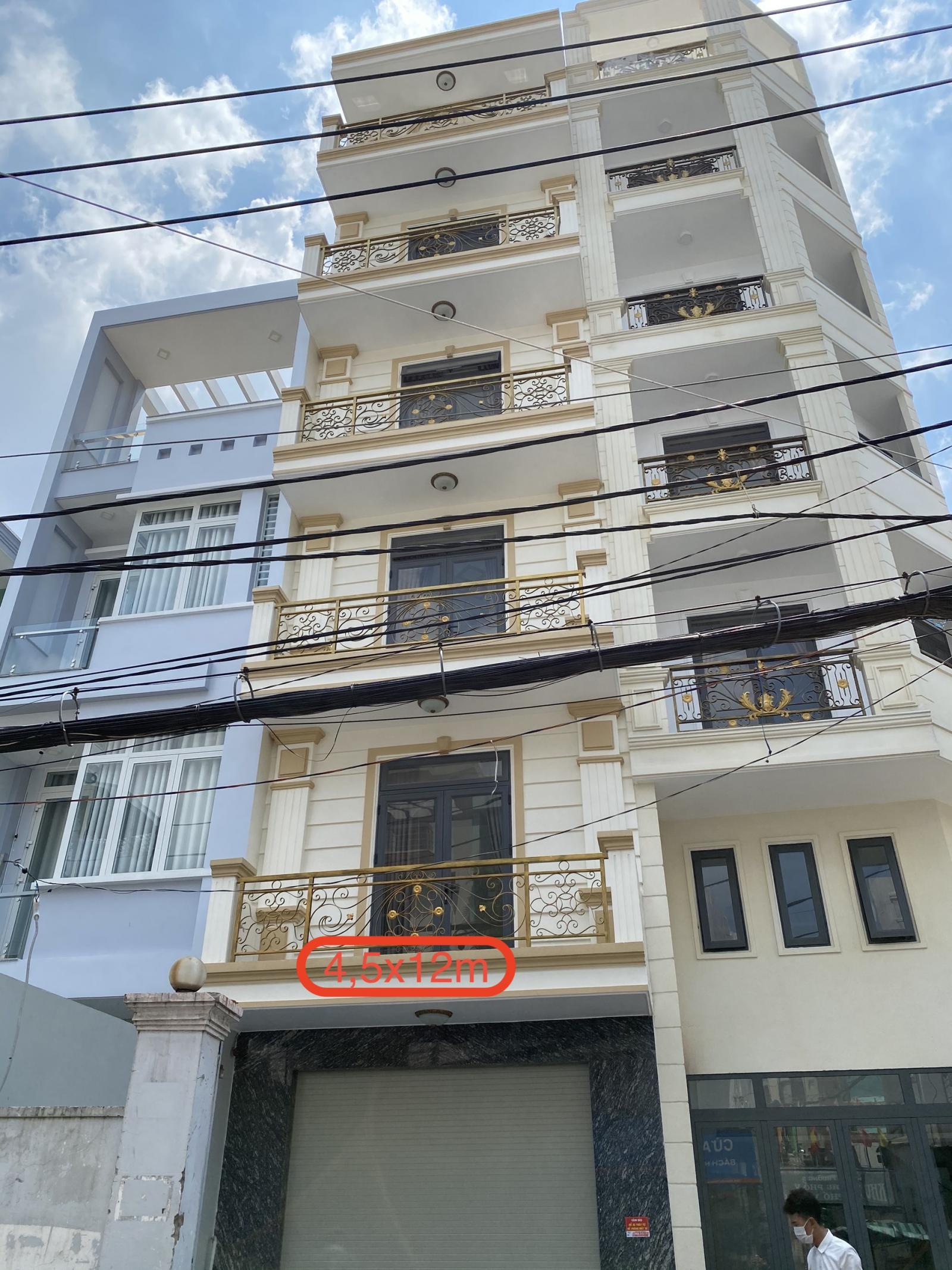 Nhà mới xây Nguyễn Thượng Hiền 4,5x18m trệt, 5lầu, 9pn, 9wc. 